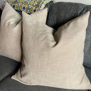 Set of down pillows with linen cases
